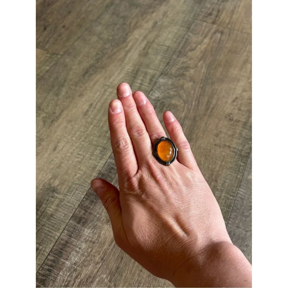 Untested women’s size 13.5 metal butterscotch amber or orange spiny oyster ring
